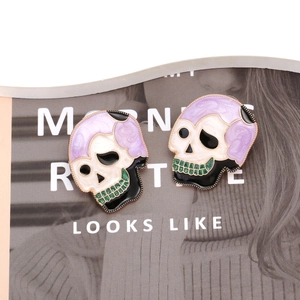 Quirky skull enamel stud earrings in pastel tones with gold trim for Halloween style