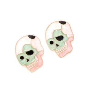 Detailed macro view of colorful enamel skull stud earrings with golden metallic outlines