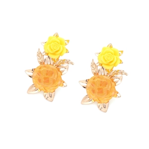 Retro resin flower earrings with yellow roses and gold metal leaves on a white background