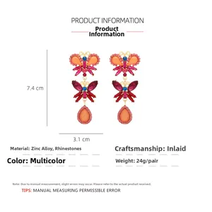 Detailed view of colorful butterfly earrings measuring 7.4cm by 3.1cm with zinc alloy rhinestones