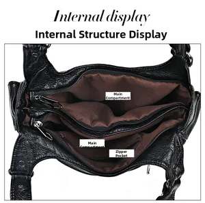 Internal structure of black leather tote bag with brown lining and multiple pockets