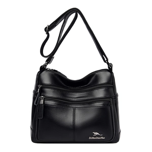 Minimalist black PU leather crossbody bag with multiple zippers and adjustable strap