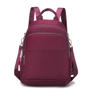 Sac à dos femme bordeaux en tissu Oxford avec nylon imperméable et détails dorés