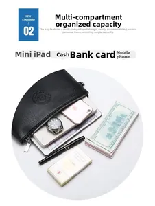 Detailed interior of black leather clutch bag with multiple compartments for iPad and phone