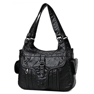 Classic black washed leather shoulder bag with multiple pockets and retro hardware details
