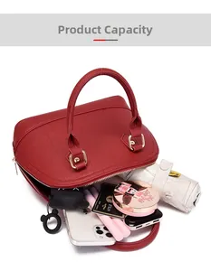 Detailed interior view of deep red shell bag showing spacious product capacity