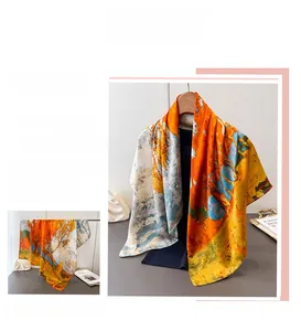Artistic abstract silk scarf featuring warm orange and blue oil painting patterns