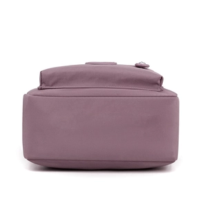 Deep purple nylon crossbody bag for women showing a detailed bottom view and fabric texture