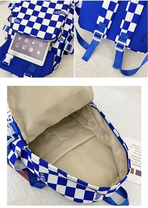 Detail view of blue and white checkerboard backpack showing compartments and laptop sleeve