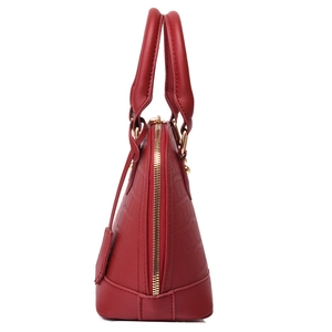 Red shell handbag with crocodile embossed leather and golden zipper closure