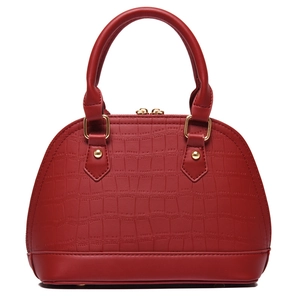 Front view of a red crocodile-embossed shell handbag with gold hardware for women