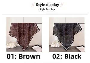 Detail view of brown and black floral cotton-linen square scarves with contrast borders