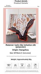 Close-up of silk-like satin scarf featuring horsebit and chain patterns on 90x90cm fabric