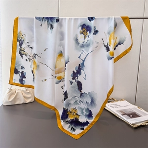 Ink style large square silk scarf with blue floral patterns and mustard yellow hem