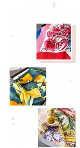 Detail view of premium silk-like scarves showing floral prints and exquisite rolled edges