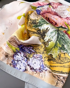 Detailed close-up of premium satin scarf with artistic floral oil painting patterns