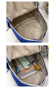 Détail de l'intérieur du sac à dos bleu en nylon montrant la capacité pour tablette