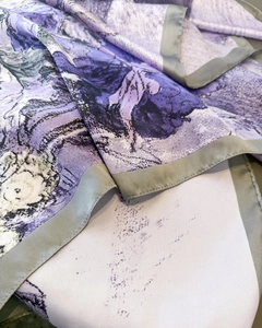Detail of silk satin scarf with purple artistic print and grey hem stitching