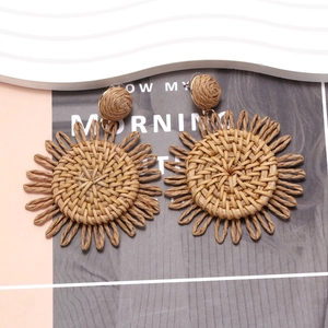 Bohemian handmade raffia sunflower tassel earrings in natural tan brown fiber