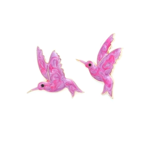 Fashionable hummingbird stud earrings with purple enamel and gold finish on white backdrop