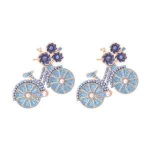 Elegant gold bicycle earrings with blue crystals, white pearls, and enamel flower detail