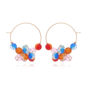 Bohemian large gold hoop earrings with colorful cracked glass beads on white background