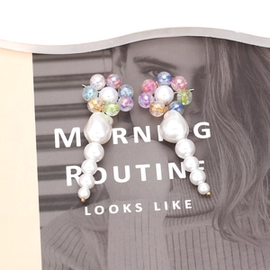 Floral beaded earrings with colorful iridescent petals and white baroque pearl drops