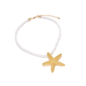 Ocean star necklace with gold starfish pendant on white twisted rope cord necklace