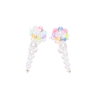 Colorful floral acrylic bead earrings with cascading white faux pearl tassels on white background