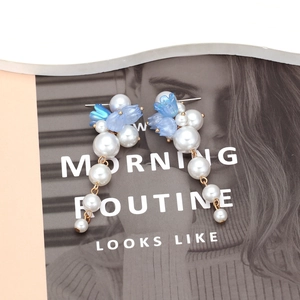 Vintage floral tassel earrings with white pearls and light blue flower accents