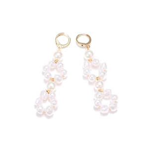Elegant Baroque pearl drop earrings with gold metal hoops in minimalist luxury style