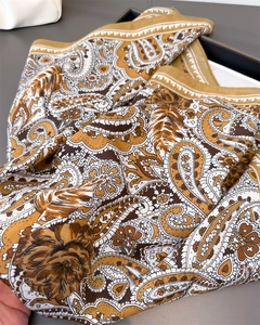 Close-up of paisley pattern on cotton-linen scarf with bohemian earthy tones