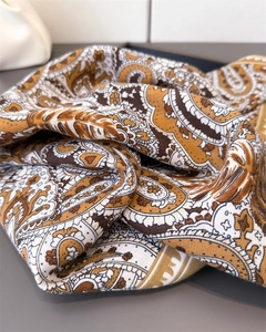Close-up of paisley pattern on ginger and coffee twill cotton linen feel scarf texture