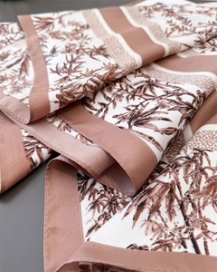 Detailed view of the Chinese style bamboo print on smooth faux silk square scarf