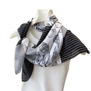 Elegant silk-like scarf with black and white leaf print and striped pattern for women