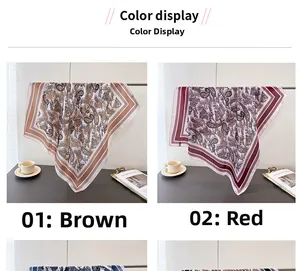 Detail view of paisley print faux silk scarves in brown and red color options