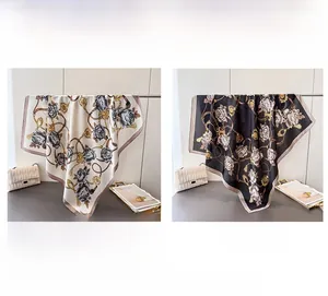 Silk-textured square scarves featuring vintage rose and chain prints in beige and black