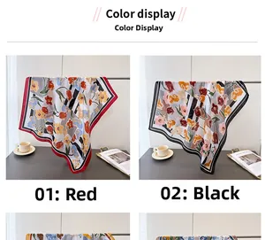 Detail view of floral print faux silk scarves in red and black bordered styles