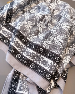 Detail of herringbone cotton linen scarf with vintage pattern and twill texture