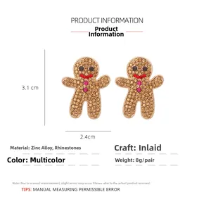 Détail des boucles d'oreilles bonhomme de pain d'épice, taille 3.1x2.4cm, poids 8g
