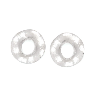 Detailed view of silver hammered round stud earrings with unique textured metal finish