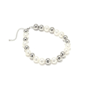 Detailed close-up of layered pearl and silver bead necklace with adjustable lobster clasp