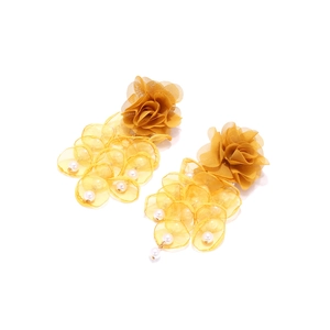 Detailed view of handmade yellow mesh flower earrings with layered petals and faux pearls