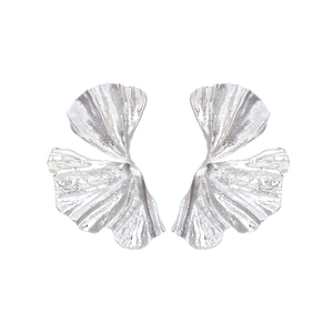 Vintage silver ginkgo leaf earrings with irregular hammered metal texture and abstract design