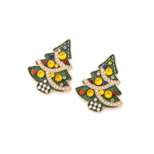 Detailed view of Christmas tree earrings with colorful rhinestones and faux pearls