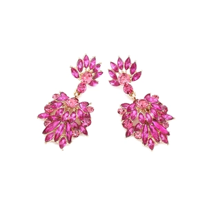 Detailed view of colorful floral crystal earrings featuring pink stones on gold alloy