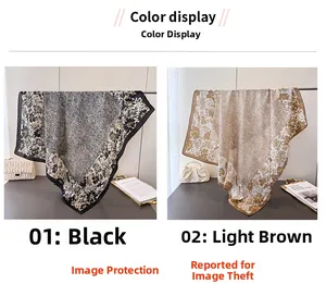 Detail of silk-like floral scarves in black and light brown with fine texture