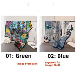 Detail of satin zebra print square scarf in green jungle and blue floral patterns