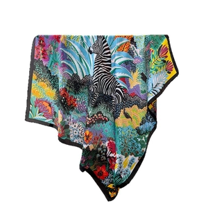 Luxurious silk-feel scarf featuring artistic zebra and tropical jungle botanical patterns