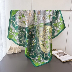 Elegant four-leaf clover silk-like scarf with green and orange floral patterns